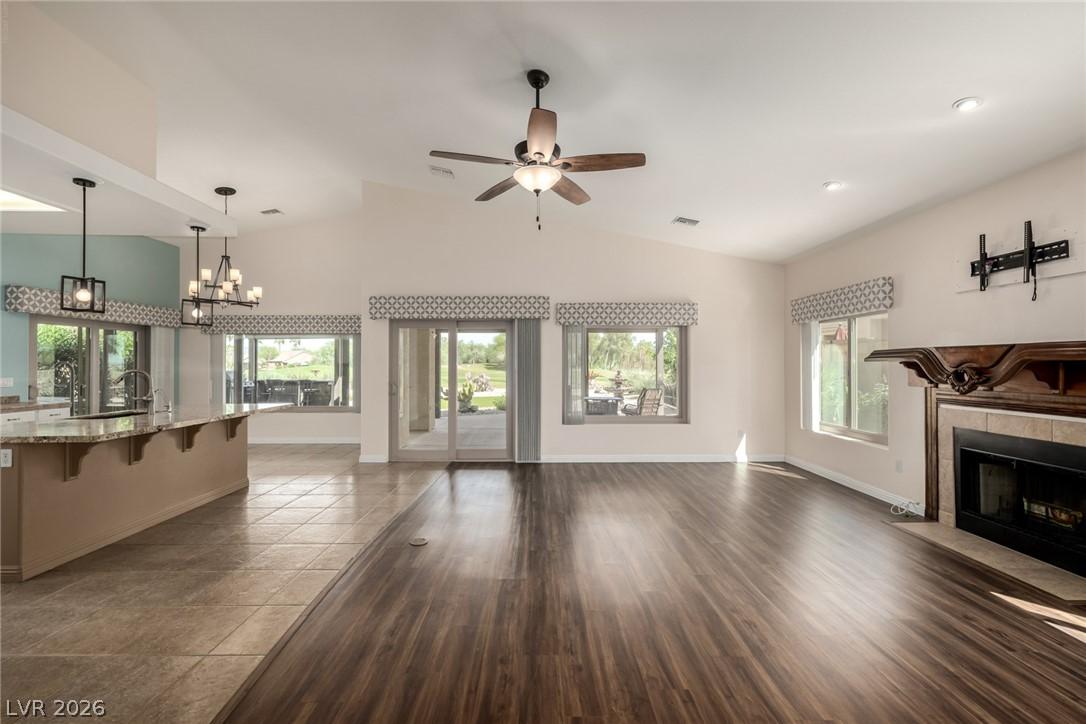 Image 4: Unfurnished living room featuring ceiling fan, a c