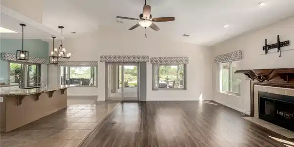 Image 4: Unfurnished living room featuring ceiling fan, a c