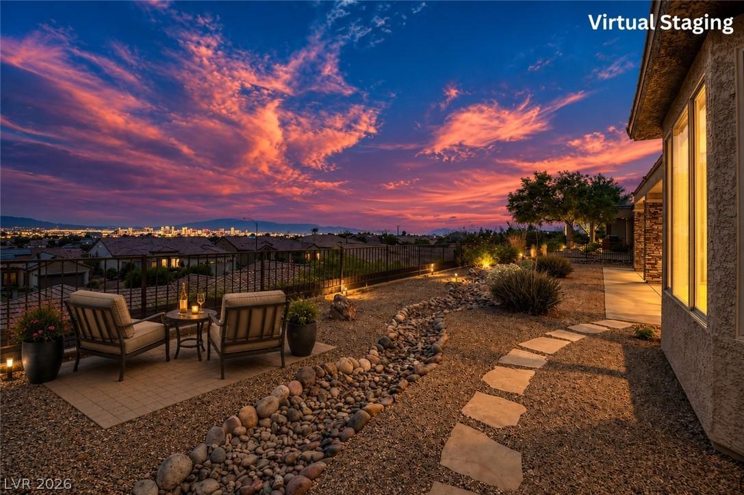 Image 3: An inviting patio area with scenic city views, per