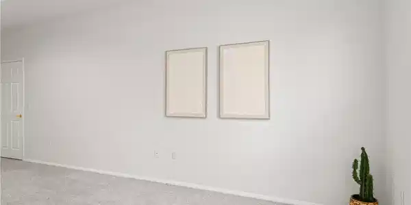 Image 4: An inviting room offering a neutral canvas for per