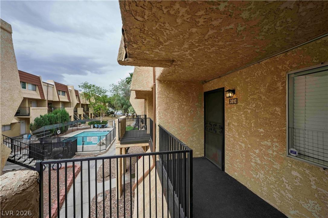 Image 3: Patio / terrace with a community pool