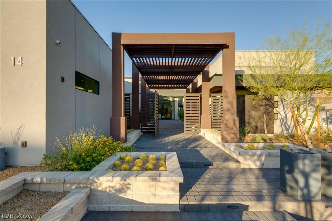 Image 3: Elegant entry to a private gated courtyard