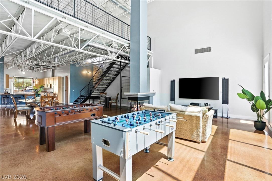 Image 4: This expansive great room offers open-concept livi
