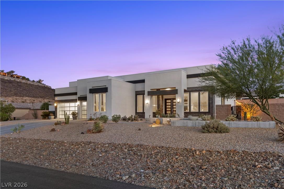 Image 3: This modern desert home features clean lines and a