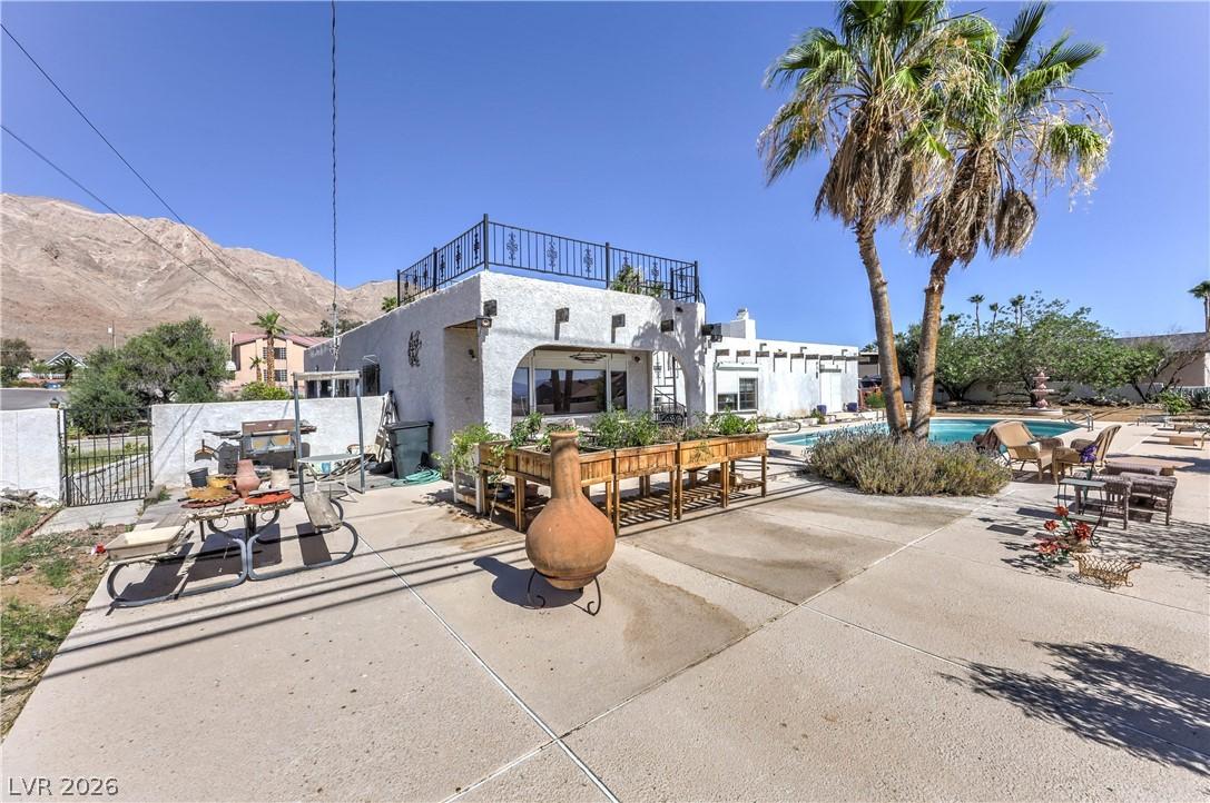 Image 4: A desert oasis, this property features a pristine
