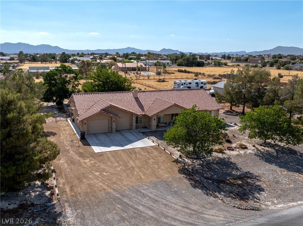 Image 3: An aerial perspective reveals a spacious residence
