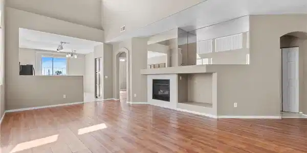 Image 4: Virtually staged. A spacious great room features s