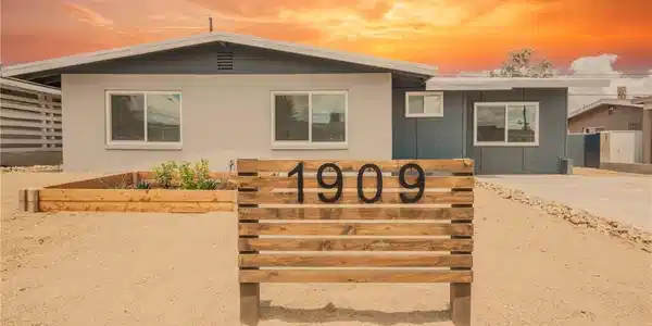 Image 3: A modernized exterior boasts a fresh two-tone pain