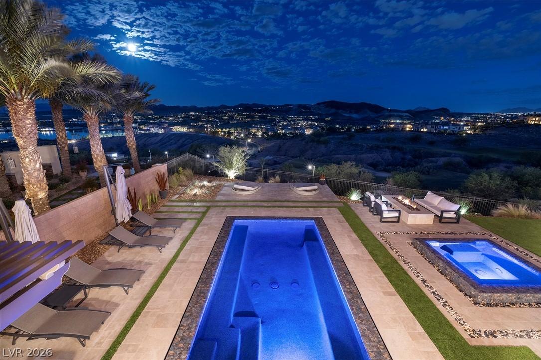 Image 2: This outdoor oasis offers breathtaking views, a tr