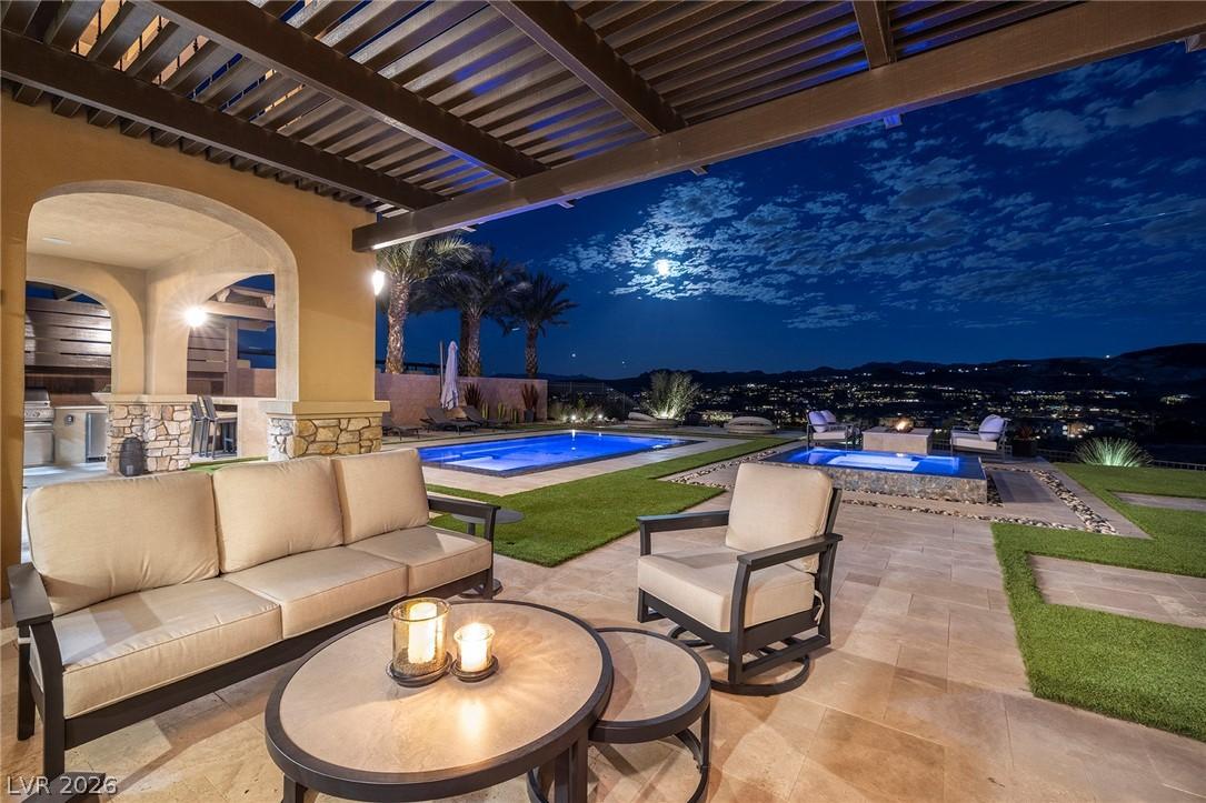 Image 4: An inviting outdoor living space with a sparkling