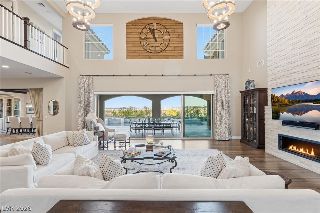 Image 3: The soaring ceilings and expansive glass doors cre