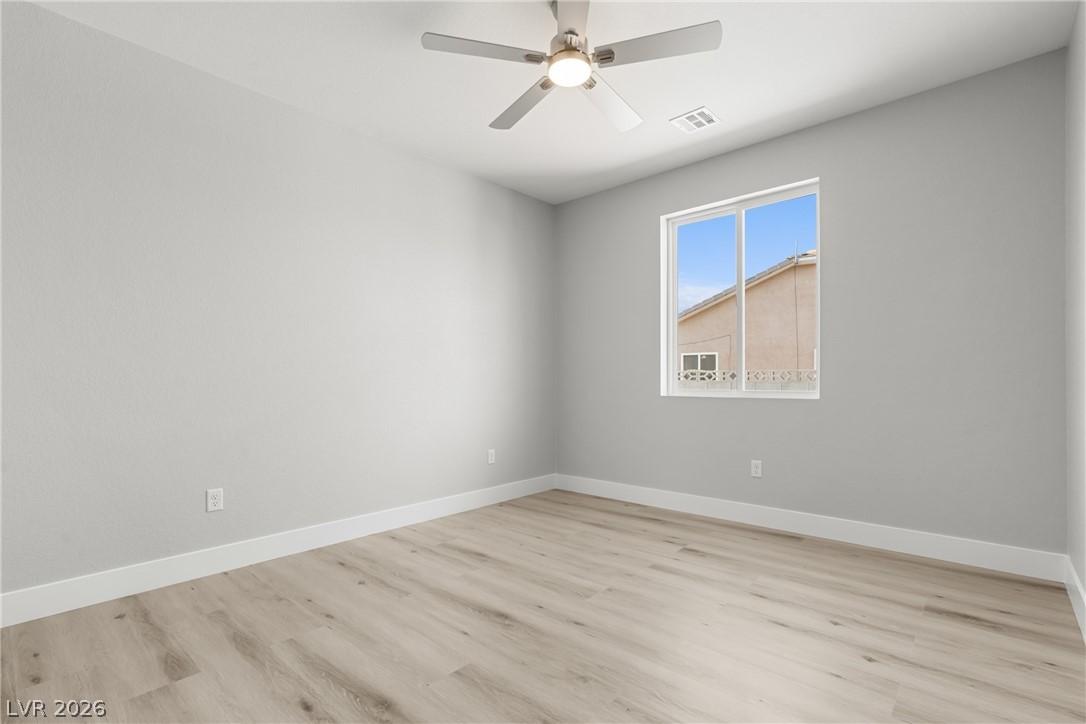 Image 4: Unfurnished room featuring ceiling fan and light w