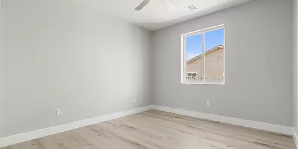 Image 4: Unfurnished room featuring ceiling fan and light w