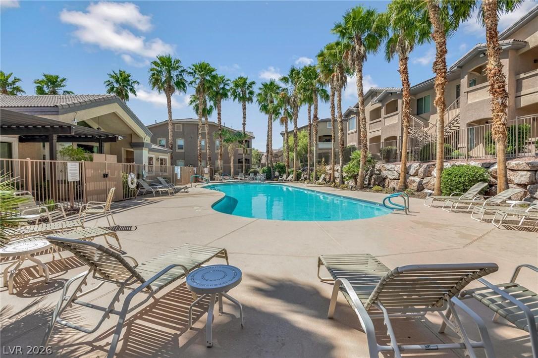 Image 2: Relax and unwind by the inviting community pool, s