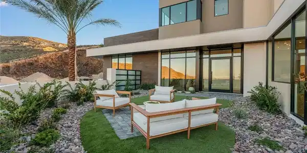 Image 3: Modern desert oasis featuring a minimalist exterio