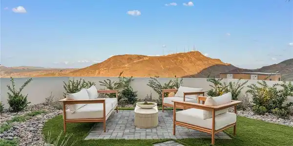 Image 4: A charming patio oasis, ideal for relaxation, with