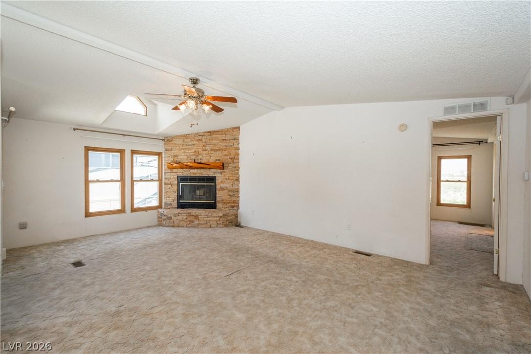 Image 3: Warm and inviting living space with a corner stone