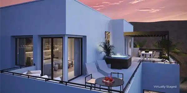 Image 2: A spacious wrap around third floor deck offers daz