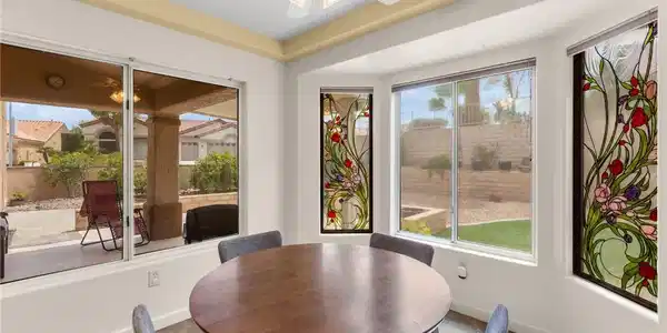 Image 4: Artistic stained glass accents and a recessed ceil