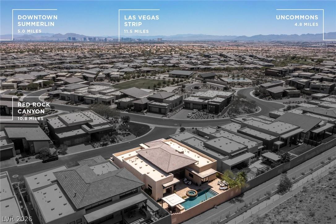 Image 3: An aerial perspective reveals a luxurious desert h