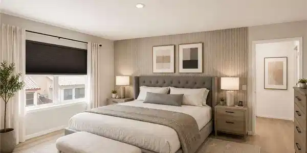 Image 4: Elegant primary bedroom offers recessed lighting a