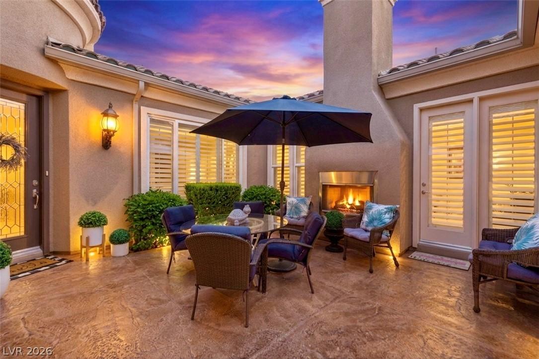 Image 2: An inviting outdoor patio, perfect for evening gat