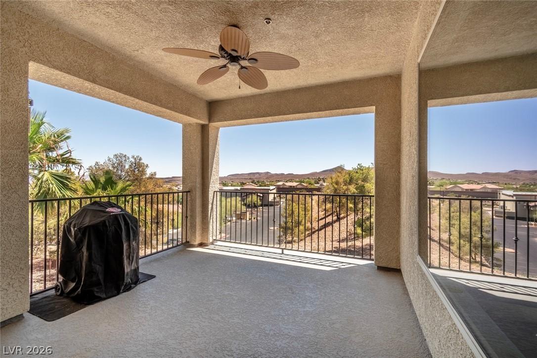 Image 2: A spacious balcony offers panoramic views of dista