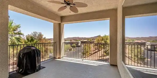Image 2: A spacious balcony offers panoramic views of dista