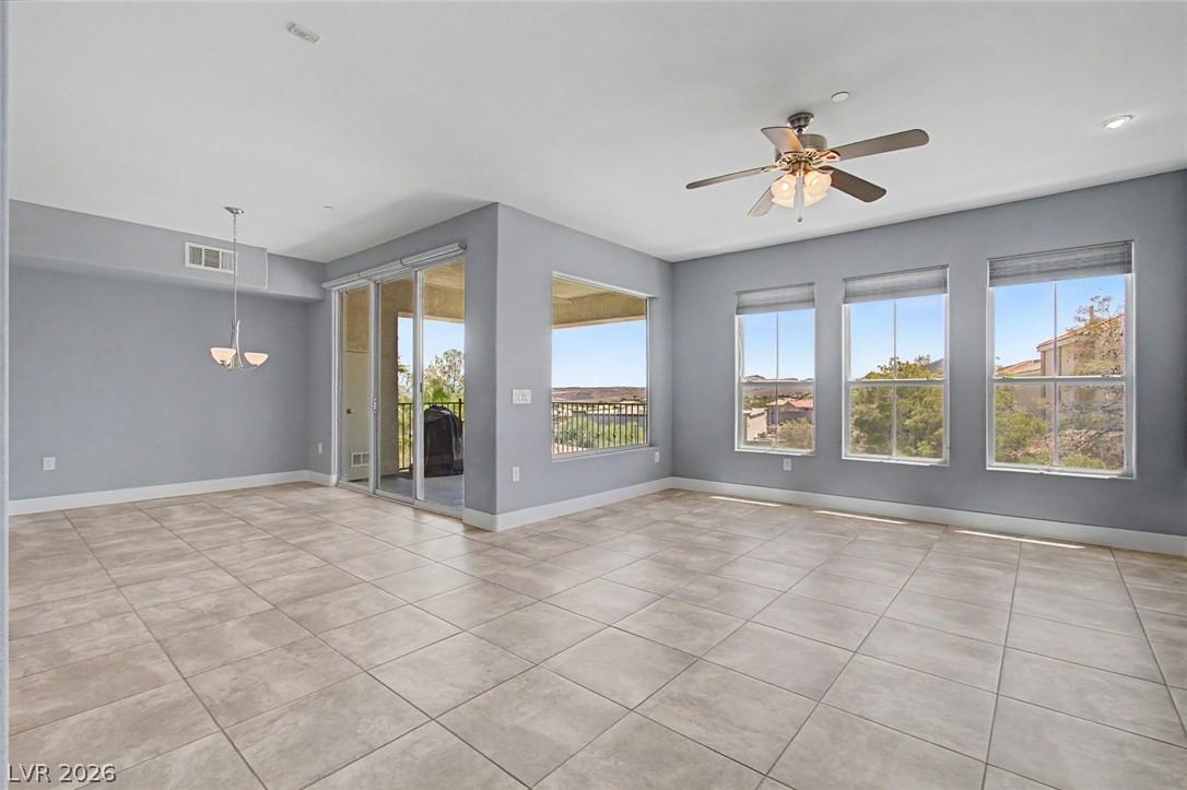 Image 4: Tile flooring extends throughout this generous liv