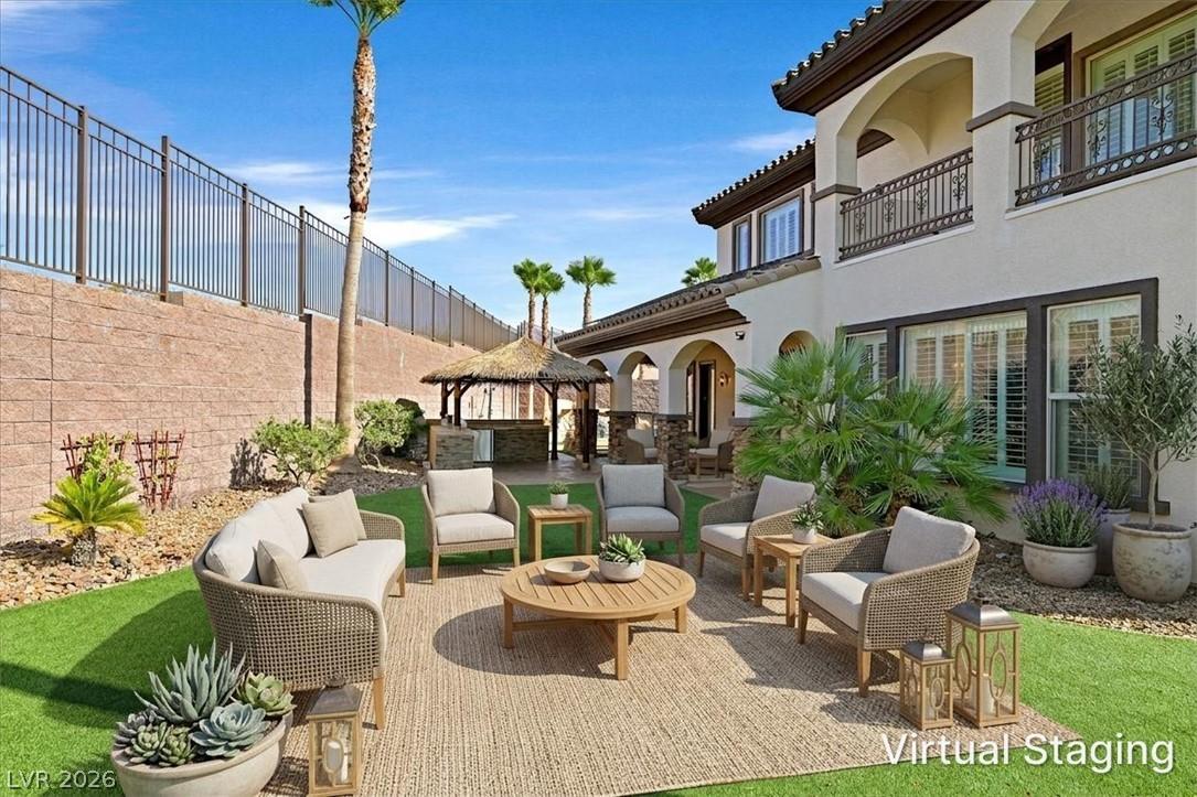 Image 4: Virtually staged Enjoy a spacious backyard featuri