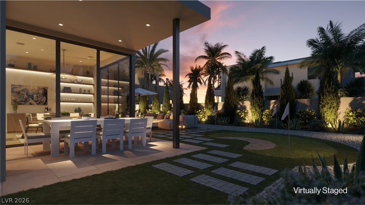 Image 2: An inviting outdoor dining area seamlessly connect