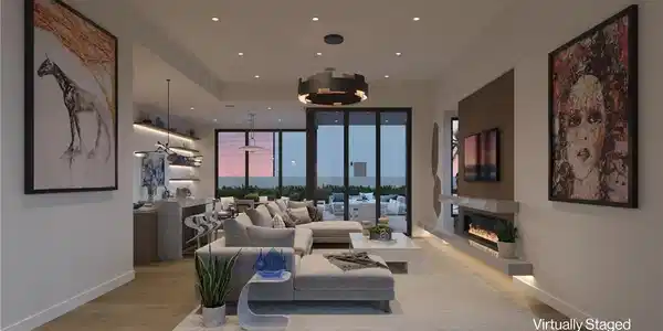 Image 4: An open-concept great room with a gas linear firep