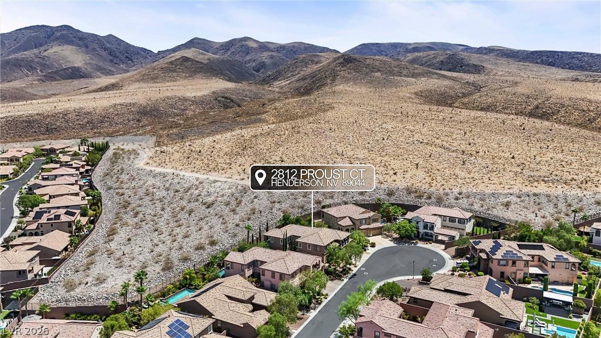 Image 4: Perched amidst rugged desert mountains, this prope