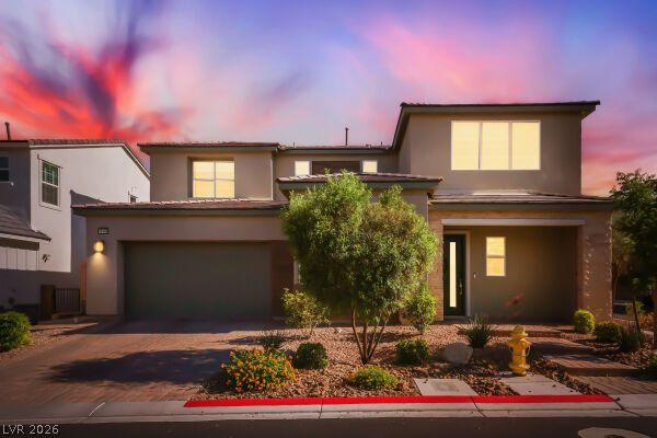 Image 2: Modern desert architecture with a welcoming garage