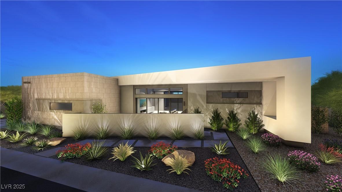 Image 1: Contemporary house featuring stucco siding