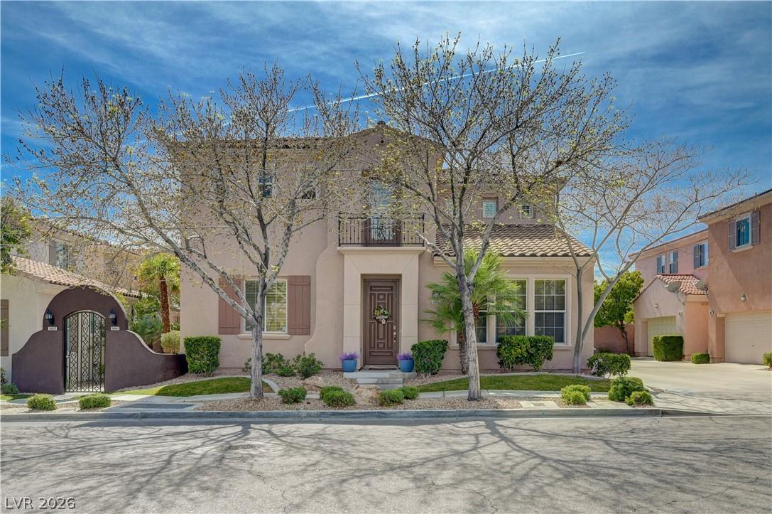 Image 1: Mediterranean / spanish house with stucco siding