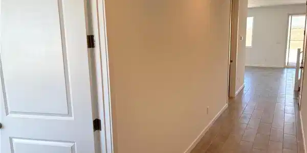 Image 2: Corridor featuring light wood finished floors and