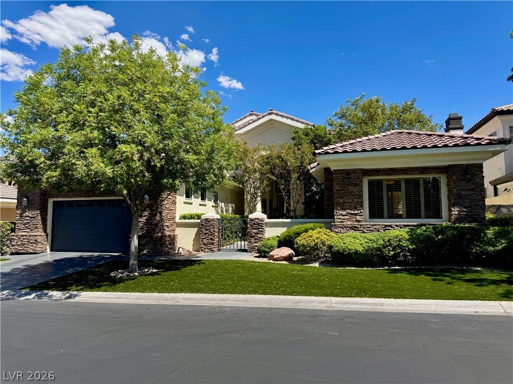 Image 4: A semi-custom home  located on tree lined street i