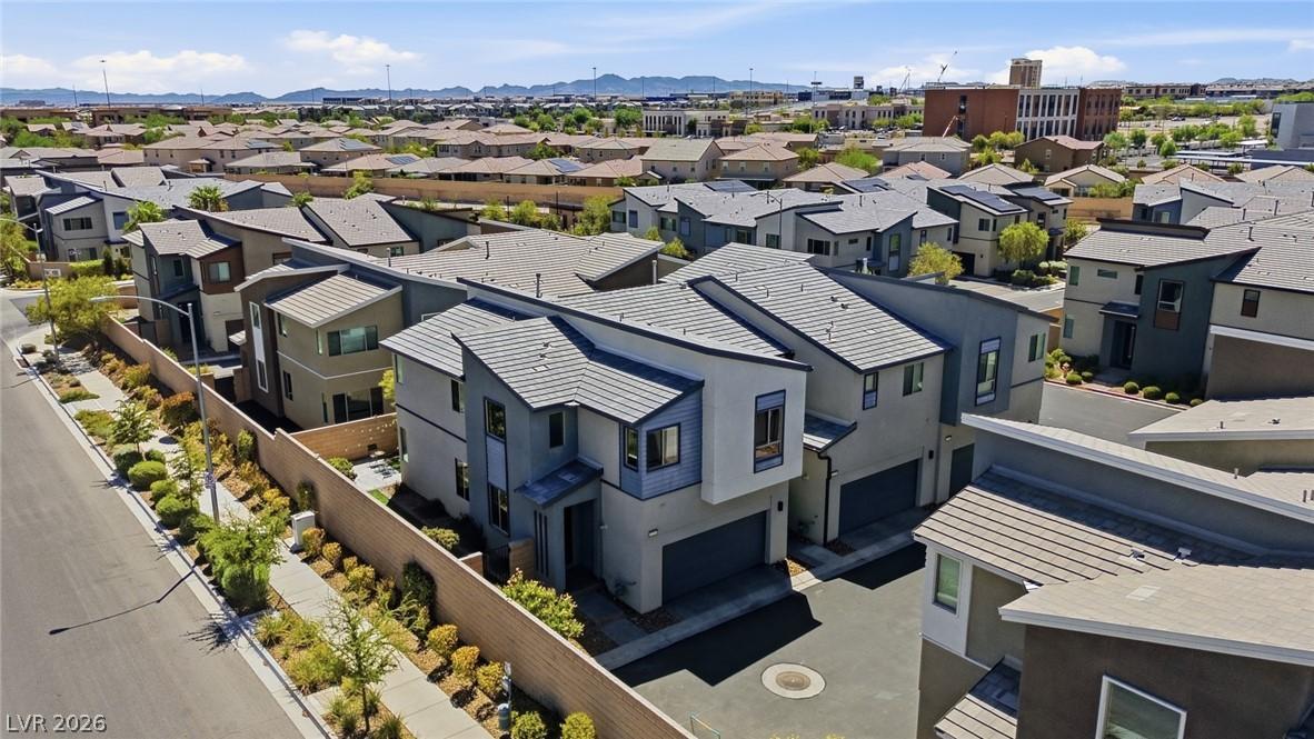 Image 3: An aerial perspective reveals a vibrant neighborho