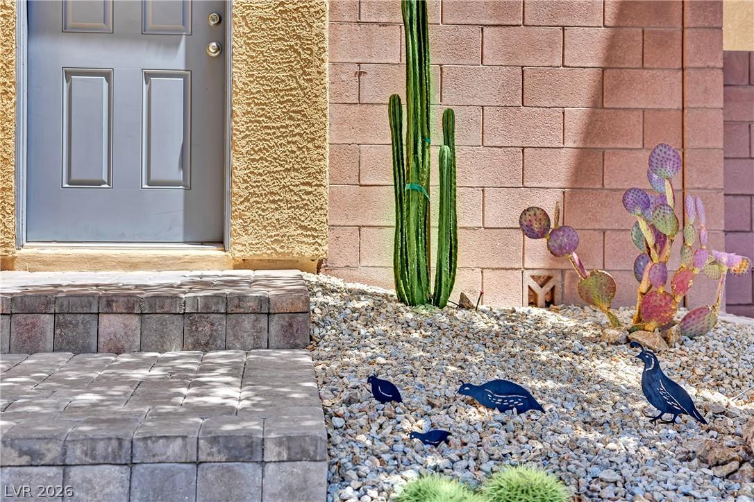 Image 3: A welcoming front entrance features sturdy block s