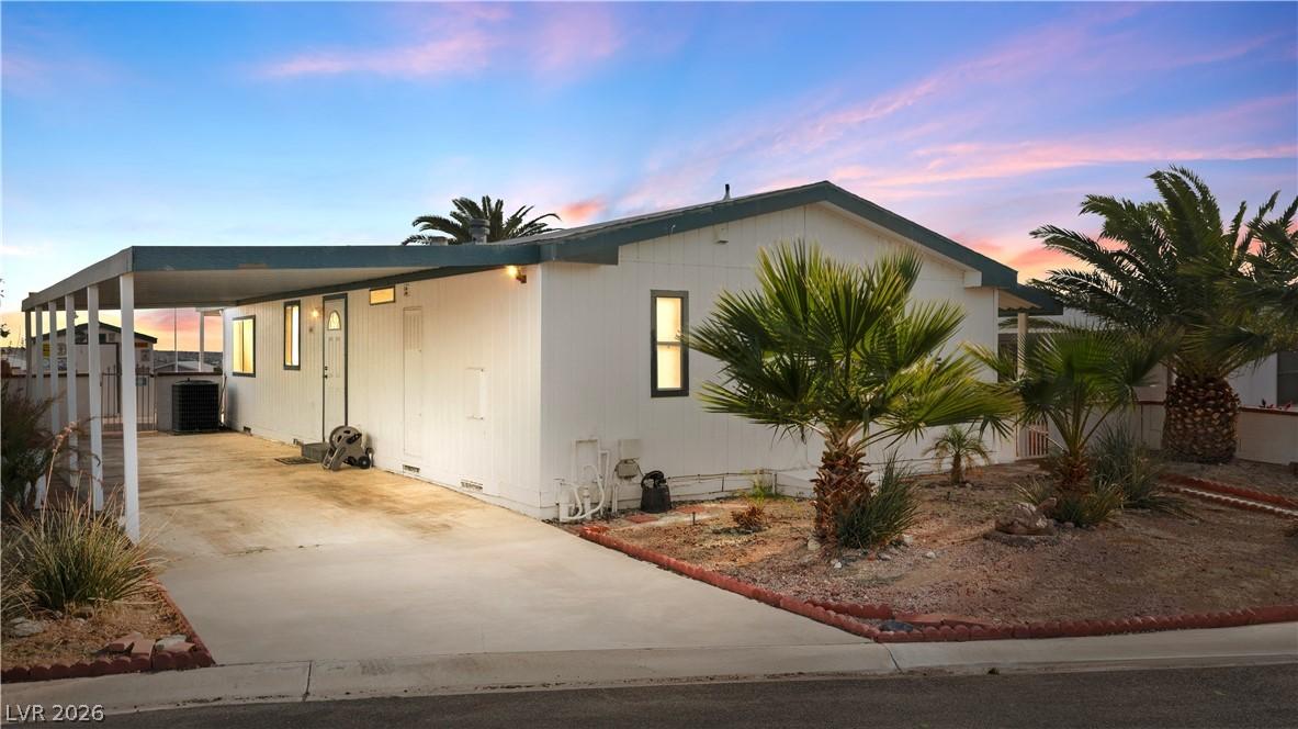 Image 1: View of front of property with crawl space, an att