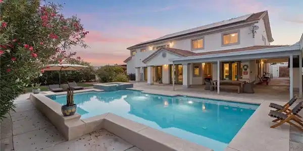 Image 4: An inviting private pool and spa define this expan