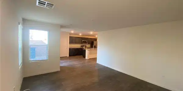 Image 4: An open floorplan seamlessly connects the well-lit