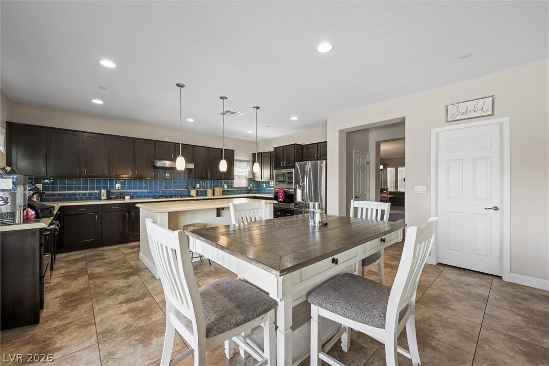 Image 4: Culinary aspirations come alive in this kitchen, f
