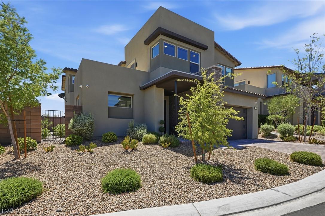 Image 4: Modern desert architecture with a stucco exterior,