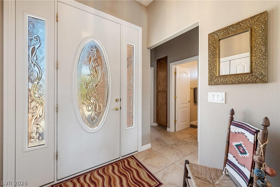 Image 4: Ornate glasswork on the entry door and sidelights