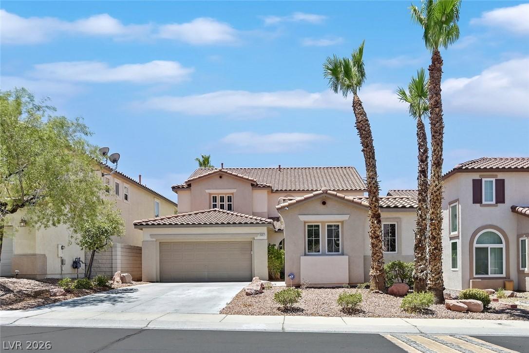 Image 1: A desert oasis with inviting curb appeal features