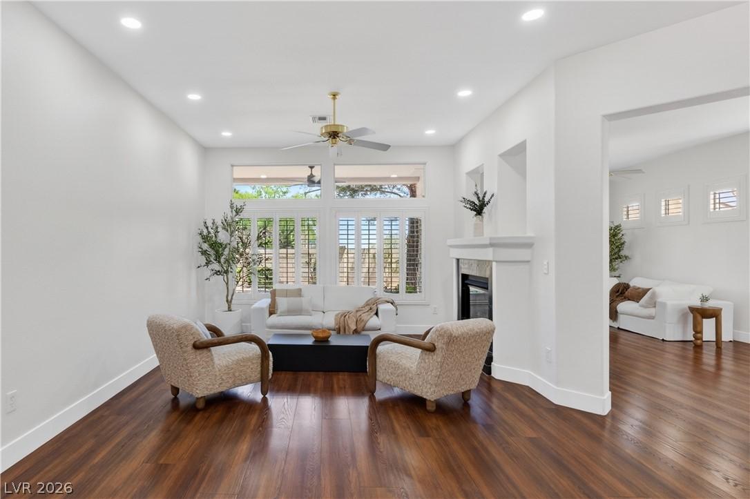 Image 1: Rich hardwood floors welcome you into this light-f