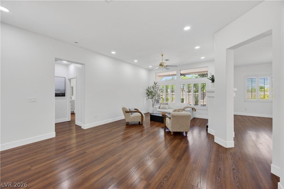 Image 2: Rich hardwood flooring creates a warm and inviting