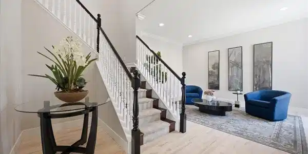 Image 4: A grand staircase with contrasting banisters ancho